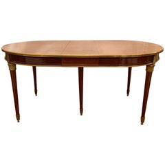 Magnificent dining table and eight chairs with ormolu bronze