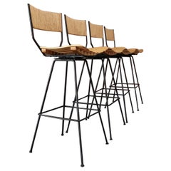 Set of Four Vintage Rush and Iron Swiveling Bar Stools by Arthur Umanoff
