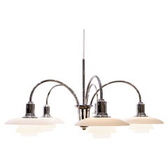 PH Bombardment Crown With 5 Arms & White opal glass shades By Louis Poulsen