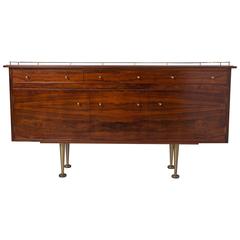 Andrew J Milne rosewood sideboard with brass feet, England circa 1950