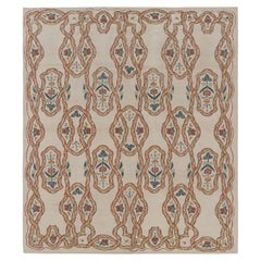 Rug & Kilim’s Tudor Style Rug in Beige-Cream with Geometric and Floral Patterns