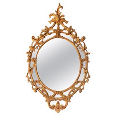 Antique Mirror ovale in legno intagliato e dorato del periodo Wood Wood