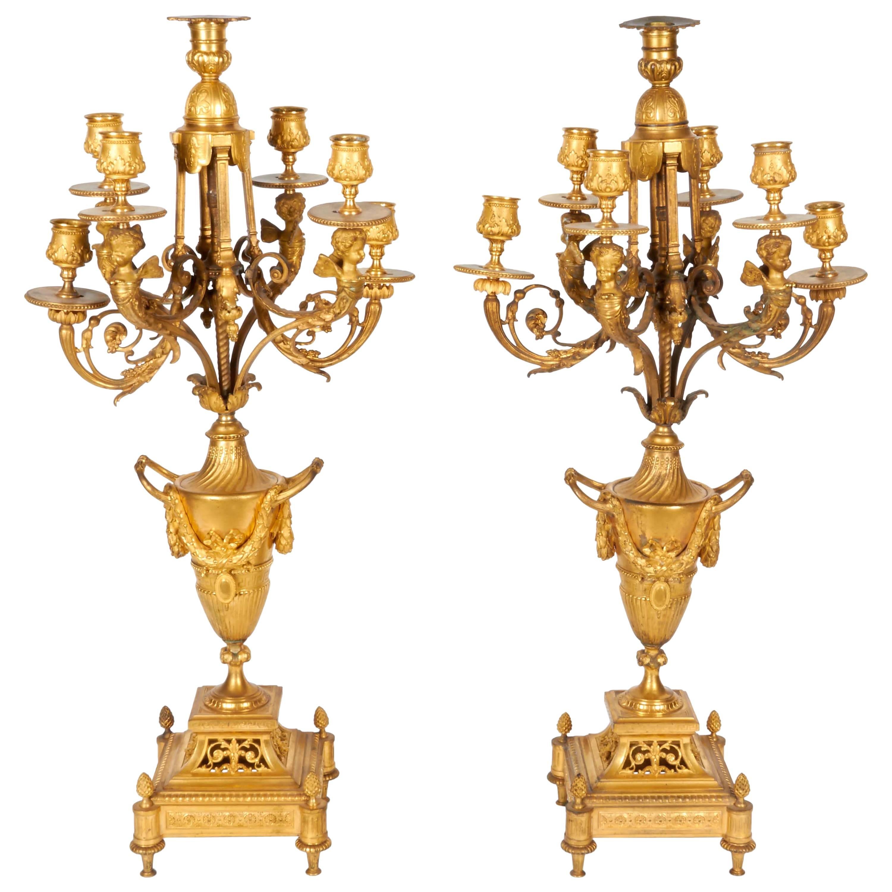 Pair of French Louis XVI Style Ormolu Gilt Bronze Candelabra with Winged Cheurbs