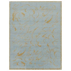 Rug & Kilim’s French Art Deco Rug in Blue with Curving Gold Patterns