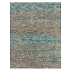 Tapis contemporain à rayures polychromes et motifs géométriques de Rug & Kilim