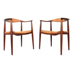 Pair of Hans Wegner Jh-501 Round Chairs in Teak + Cane