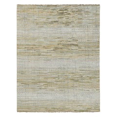 Tapis contemporain à rayures polychromes et motifs géométriques de Rug & Kilim