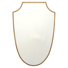Wandspiegel in Form eines Messingschildes, Italien