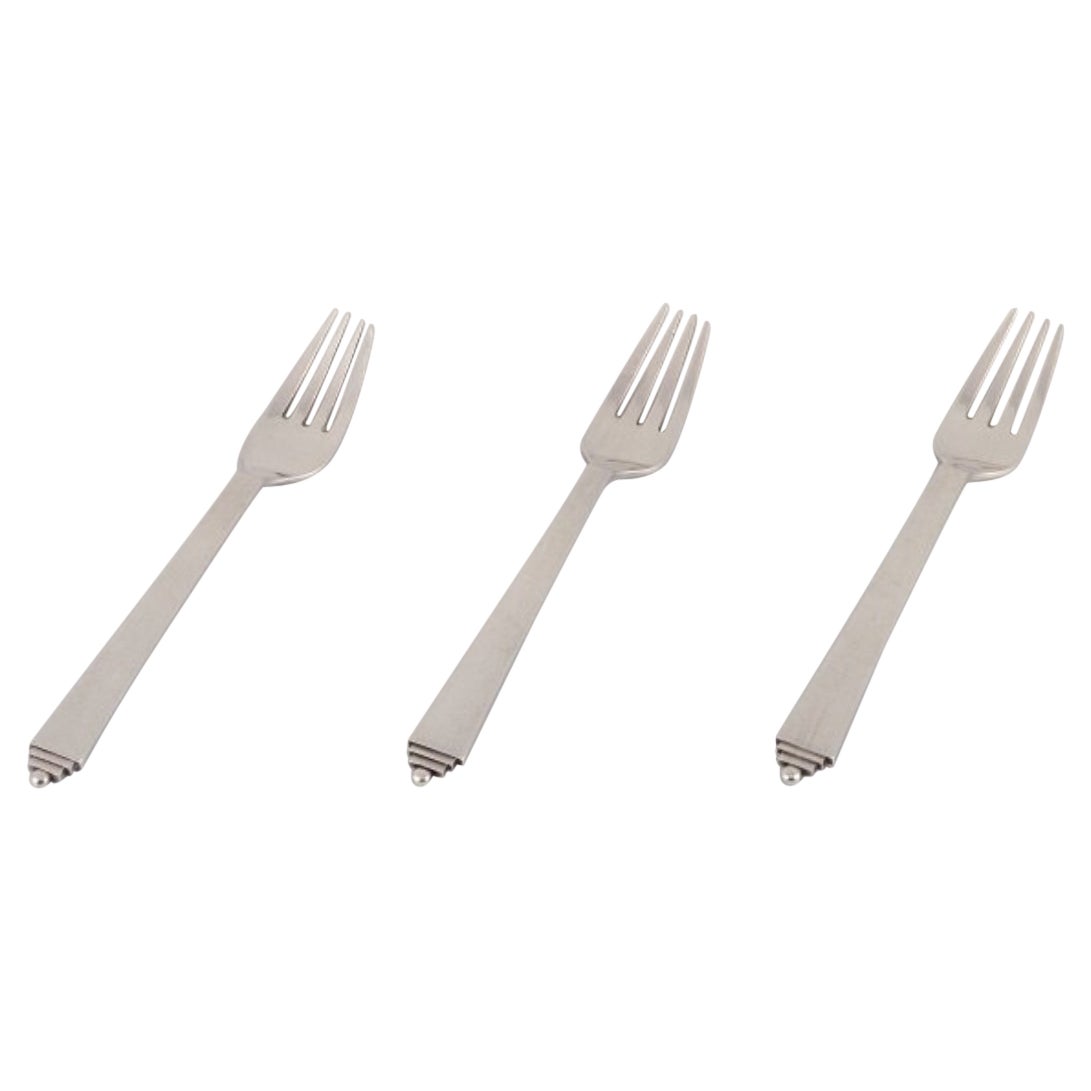 Pirámide Georg Jensen. Tres tenedores de almuerzo de plata de ley.