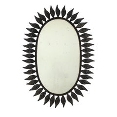 Miroir ovale espagnol Sunburst en métal avec cadre feuilleté