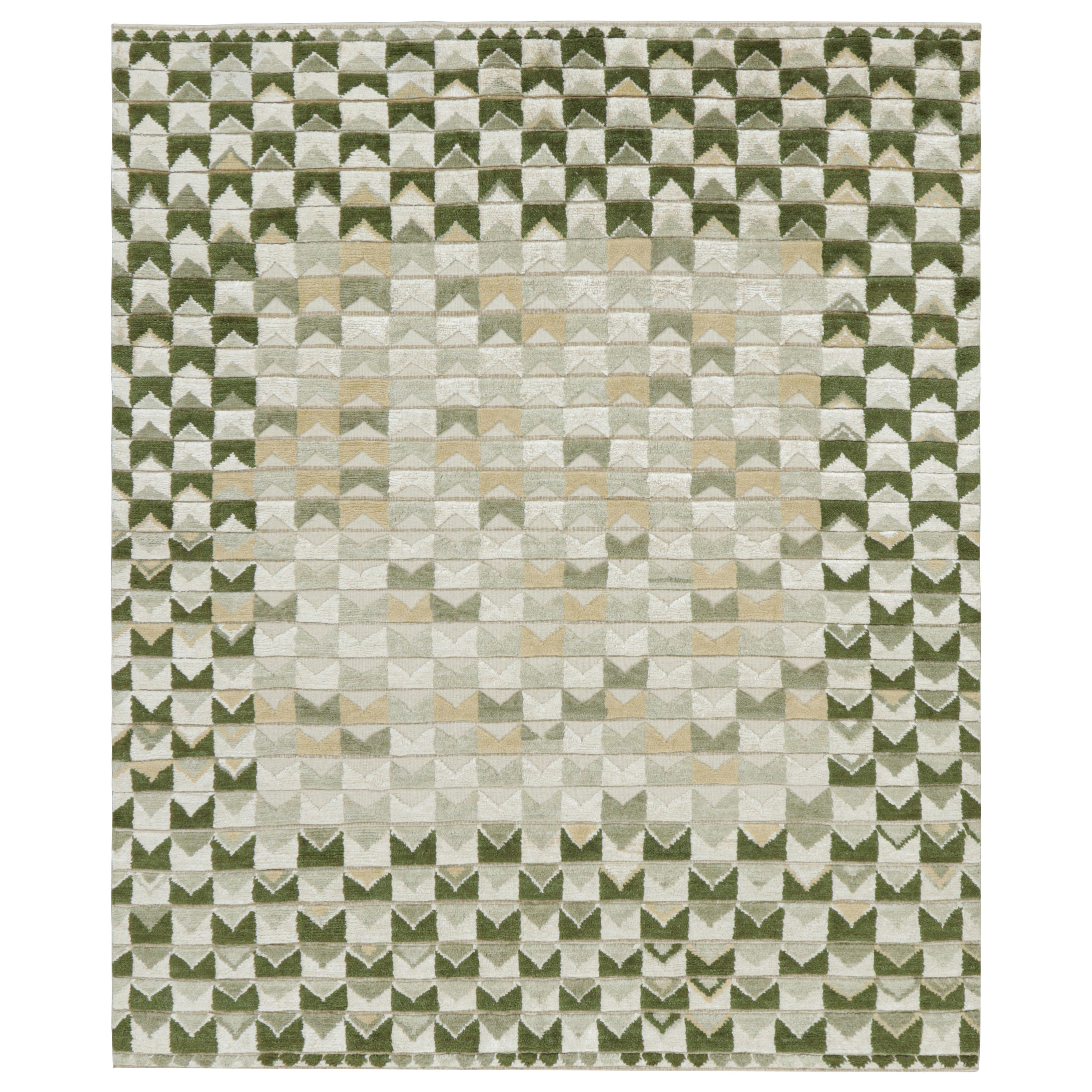 Tapis de style scandinave à motifs géométriques en vert et blanc de Rug & Kilim