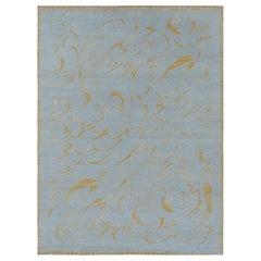 Rug & Kilim è un tappeto in stile Art Deco francese in blu con motivi geometrici dorati