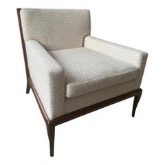 Poltrona personalizzata nello stile di  T.H. Robsjohn-Gibbings.