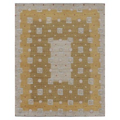Tappeto personalizzato in stile scandinavo di Rug & Kilim con motivi geometrici oro e crema