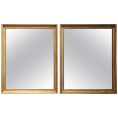 Pair of 19th Century French Directoire Carved Gilt Wood Wall Mirrors