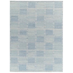 Tejido plano de estilo escandinavo con diseño geométrico azul by Rug & Kilim