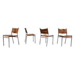 Four Patinated Leather Dining Chairs by Martin Visser