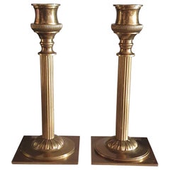 A truly unique one of a kind pair of Maison Charles handmade Bronze Candlesticks