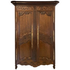 Armoire/penderie en chêne sculpté du 18ème siècle de qualité exceptionnelle