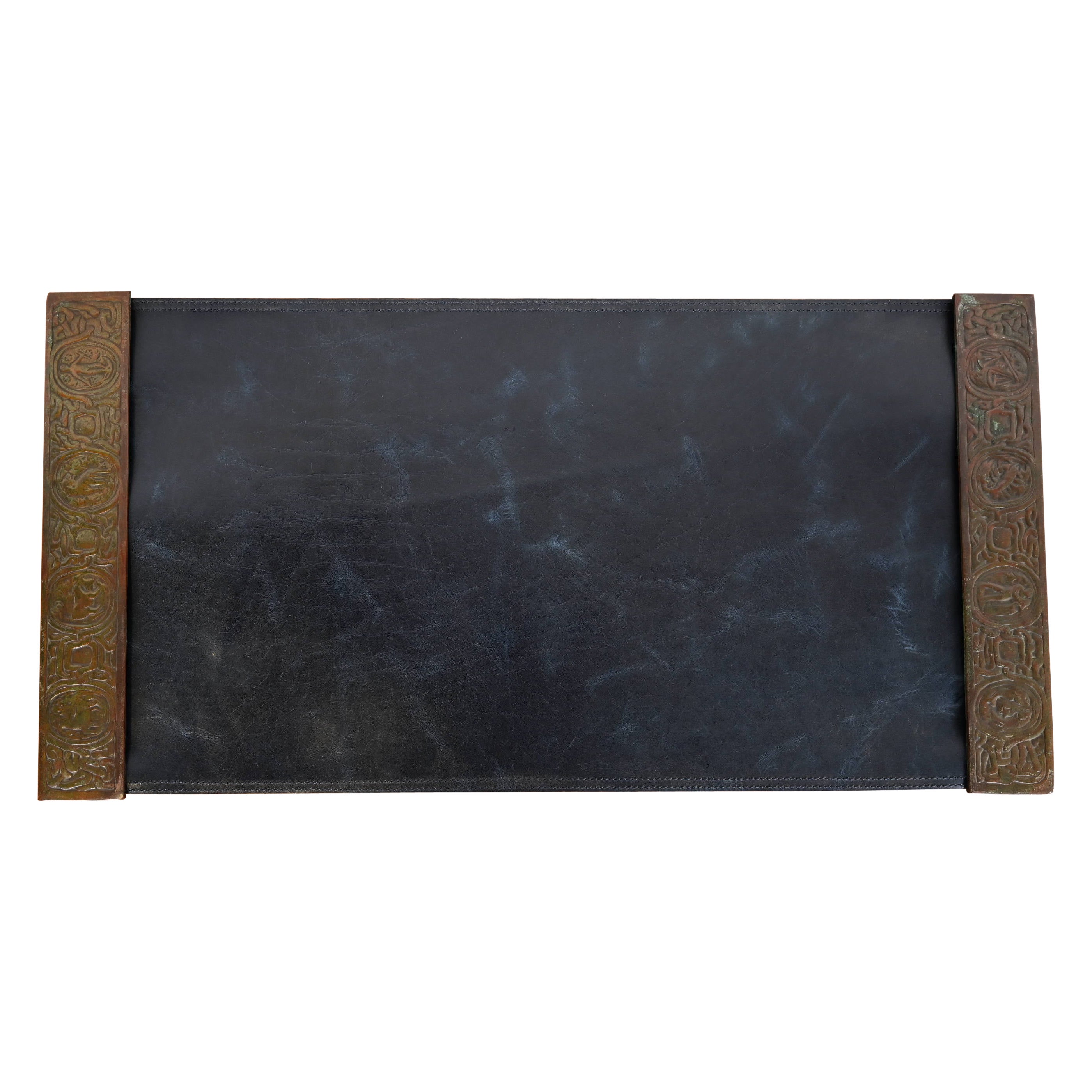 How do I clean a leather desk blotter?