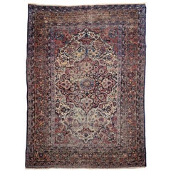 Tappeto persiano Kashan del XIX secolo con motivo floreale in avorio, marina e zafferano
