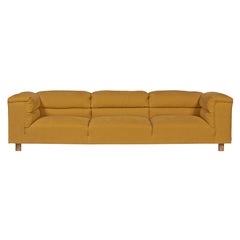 Cypress sofa upholstered in yellow fabric by Bow and Arrow