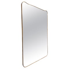 An extra large 1950s Italian brass mirror in the style of Gio Ponti