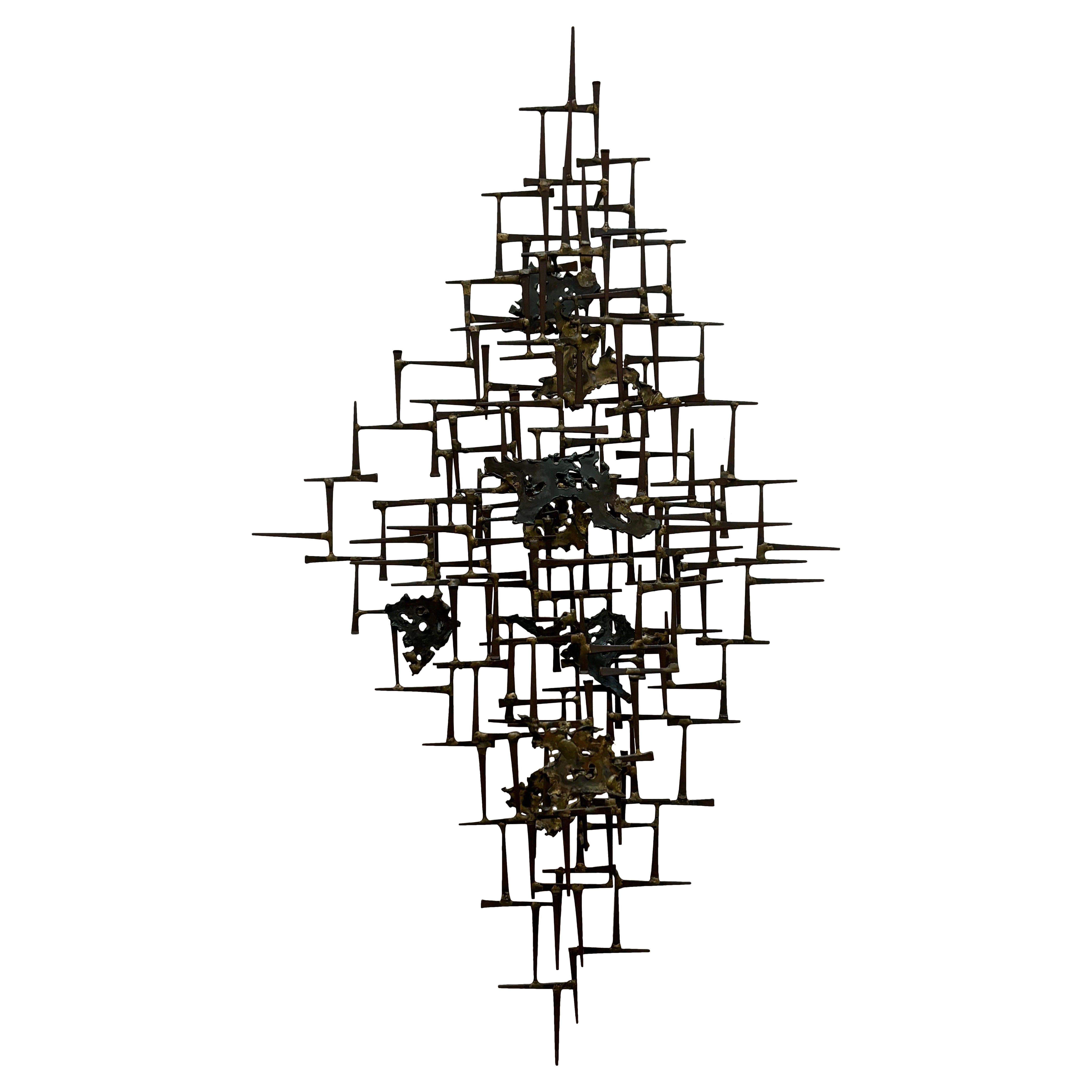 Escultura de uñas de pared