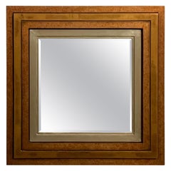 Specchio con spessore a quattro riporti e ricche finiture metalliche