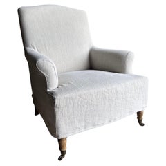 Sedia Club Alma rivestita in lino con gambe in Oak bianco e ruote piroettanti