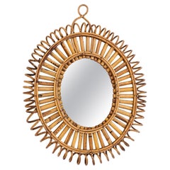 Espejo oval de mimbre y bambú, años 60