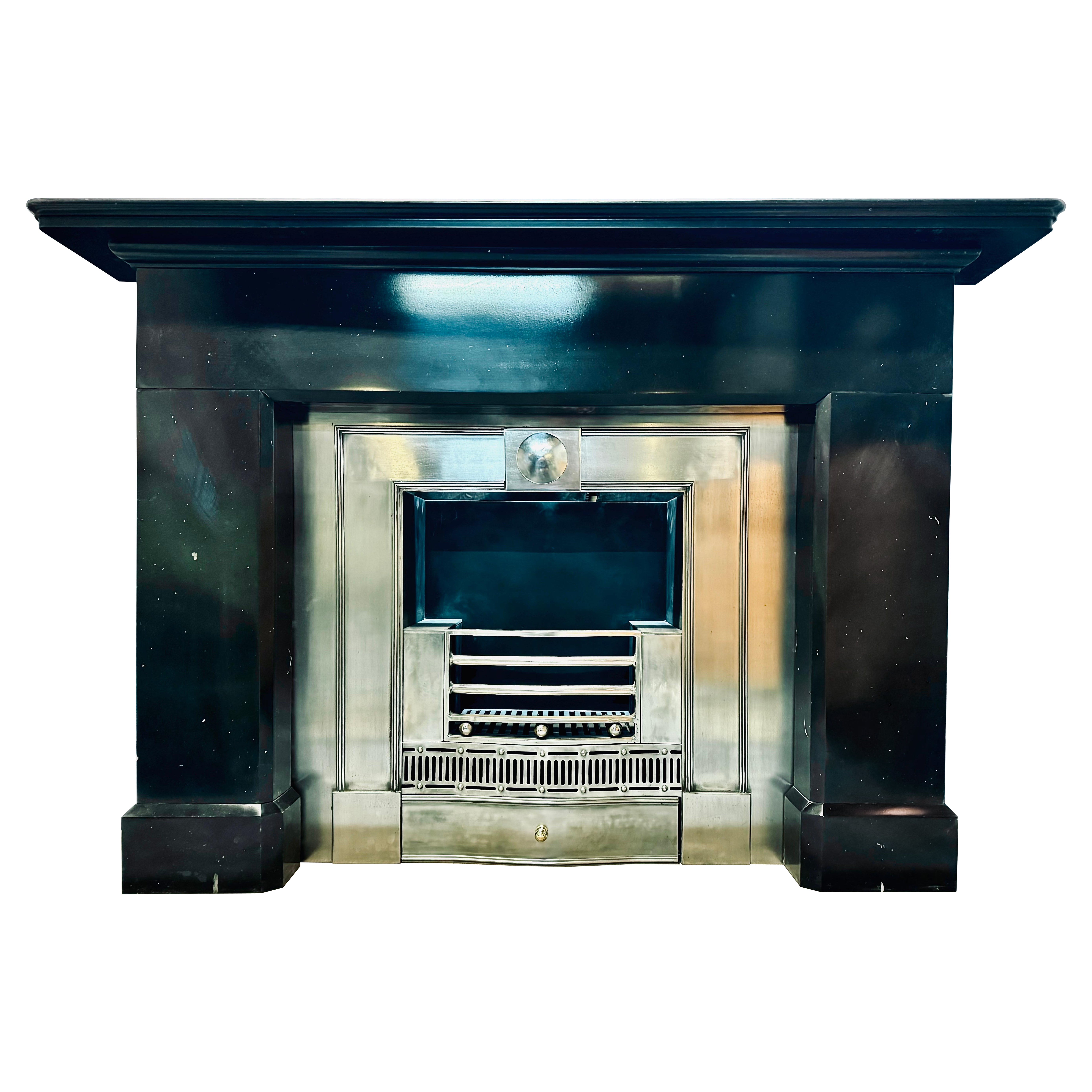 A Mid 19th Century Victorian Scottish Belgian Black Marble Fireplace Surround.