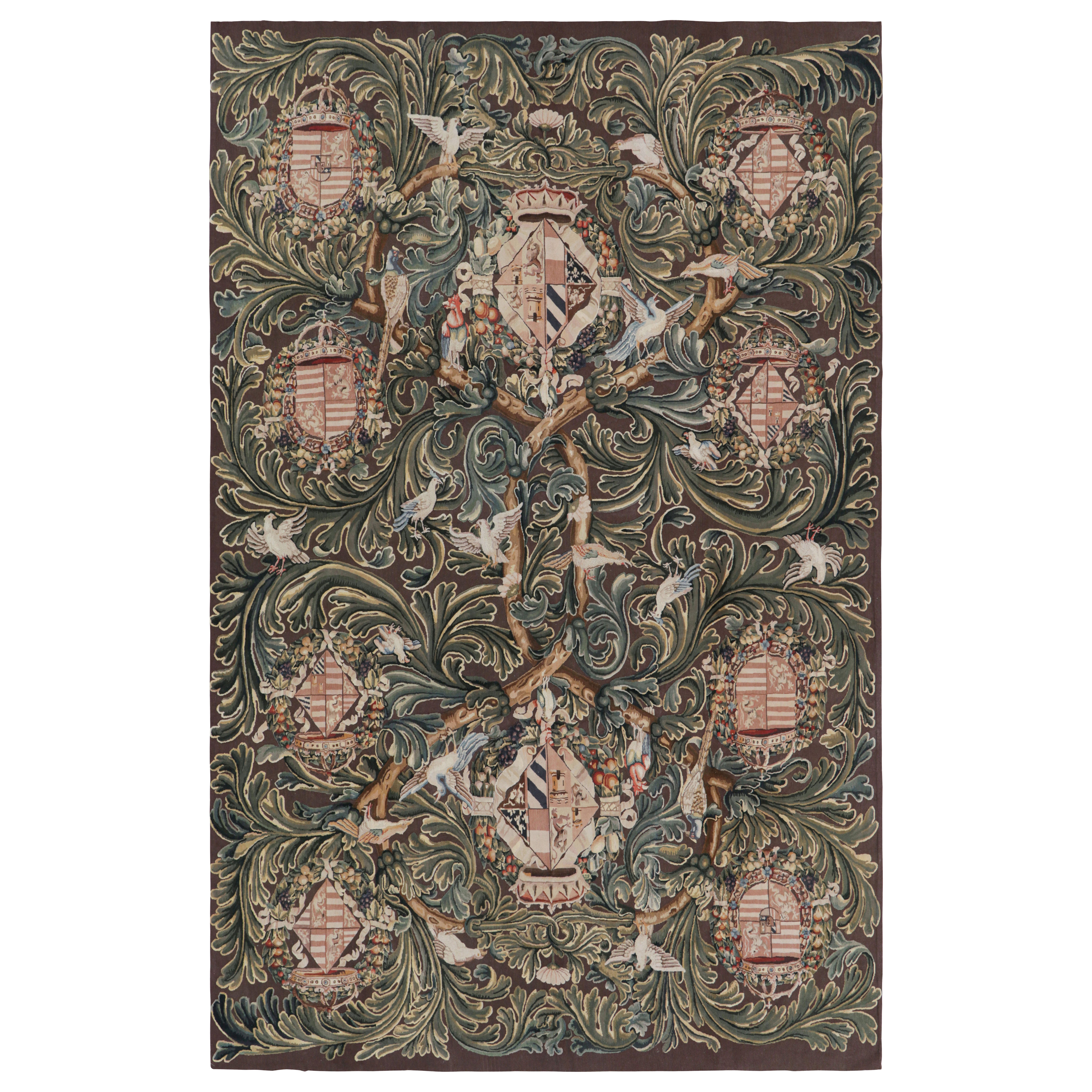 Rug & Kilim’s Armorial Tudor Style Rug in Black, with Beige, Blue and Gold Tones