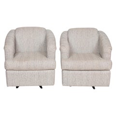 Paire de fauteuils club pivotants contemporains en gris