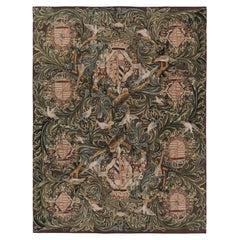 Rug & Kilim's Armorial Tudor Style Rug in Black, with Beige, Blue and Gold Tones (Tapis armorial de style Tudor en noir, avec des tons beiges, bleus et or)