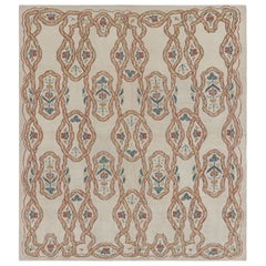 Rug & Kilim’s Tudor Style Rug in Beige-Cream with Geometric and Floral Patterns