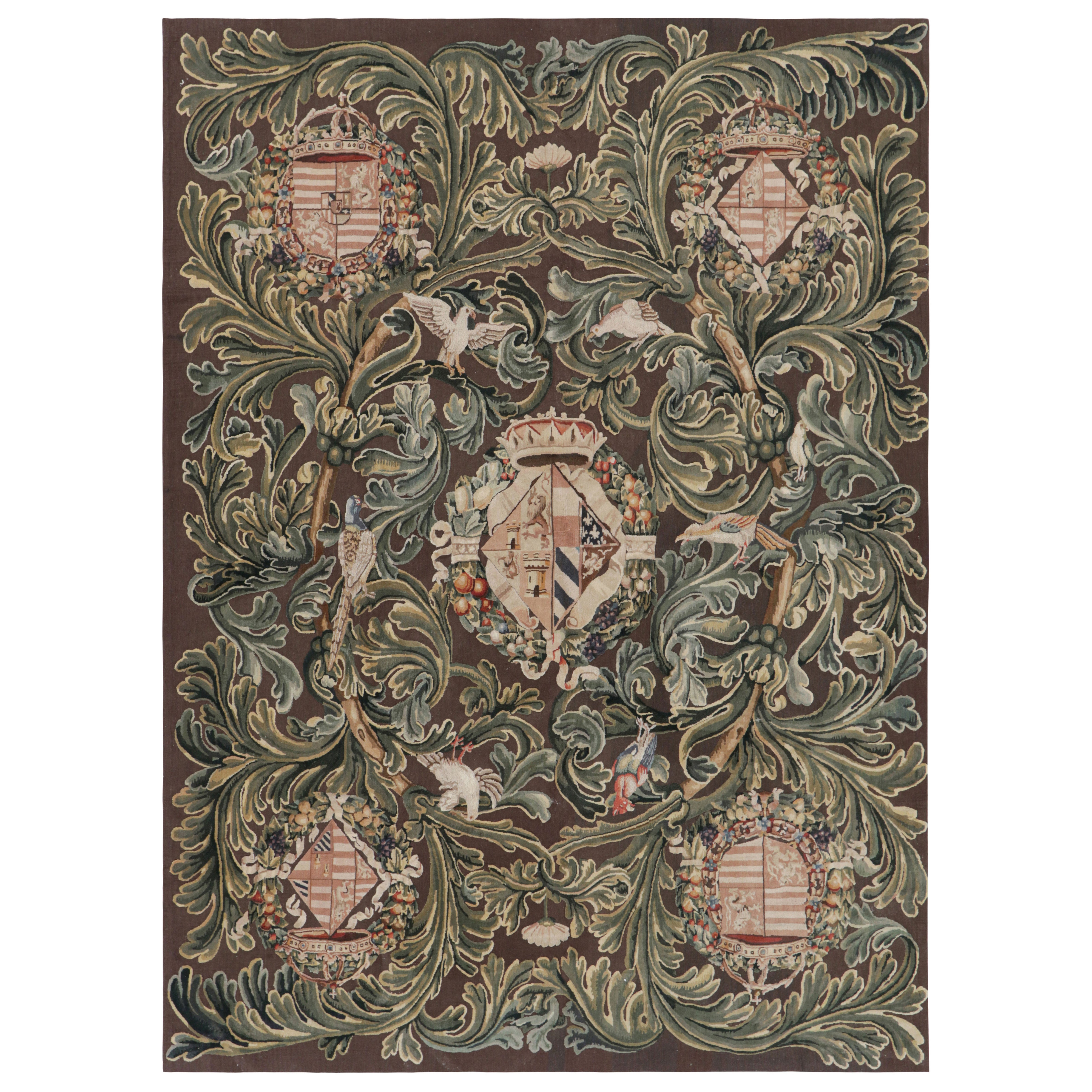 Rug & Kilim’s Armorial Tudor Style Rug in Black, with Beige, Blue and Gold Tones