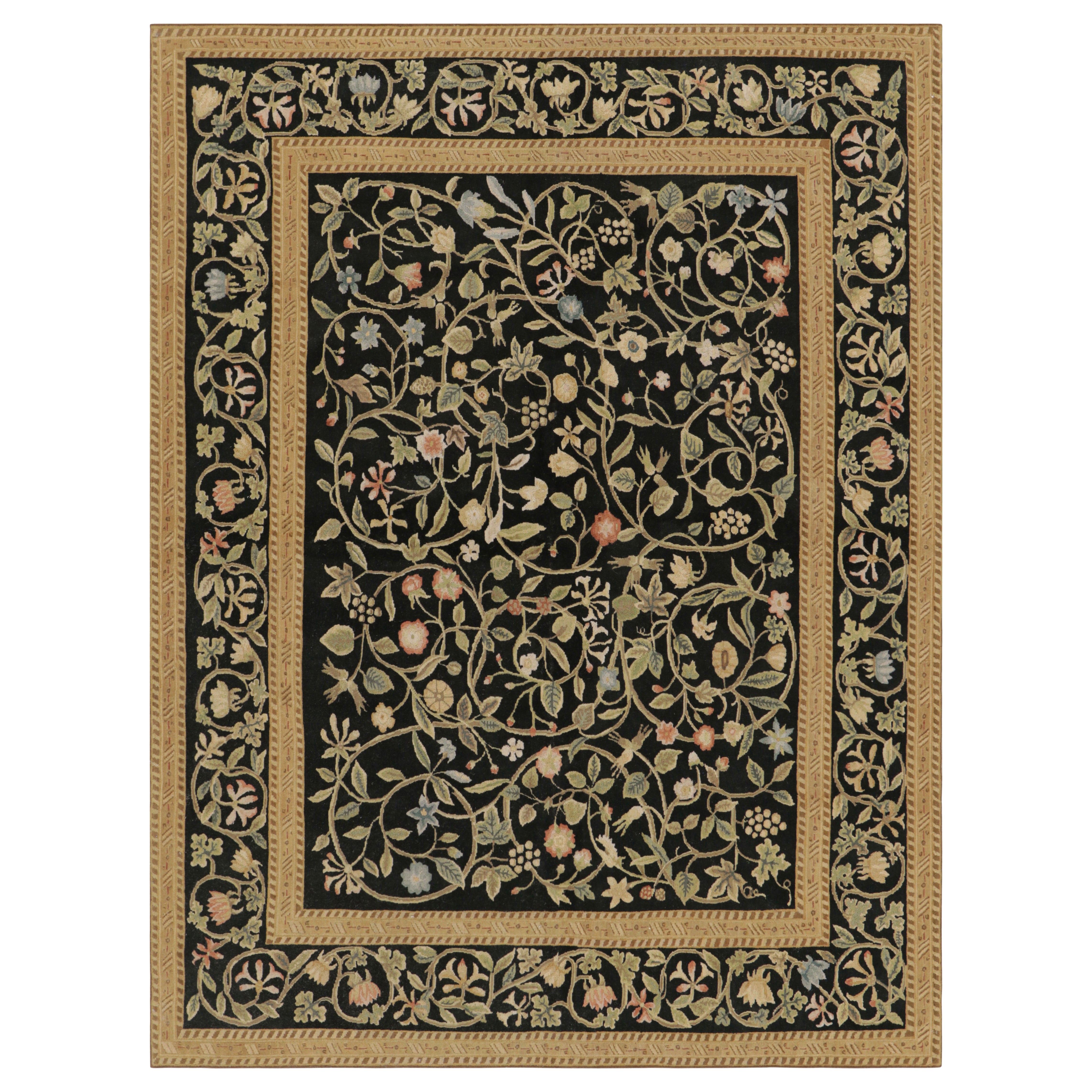 Rug & Kilim’s Tudor Style Rug in Black and Gold with Floral Patterns