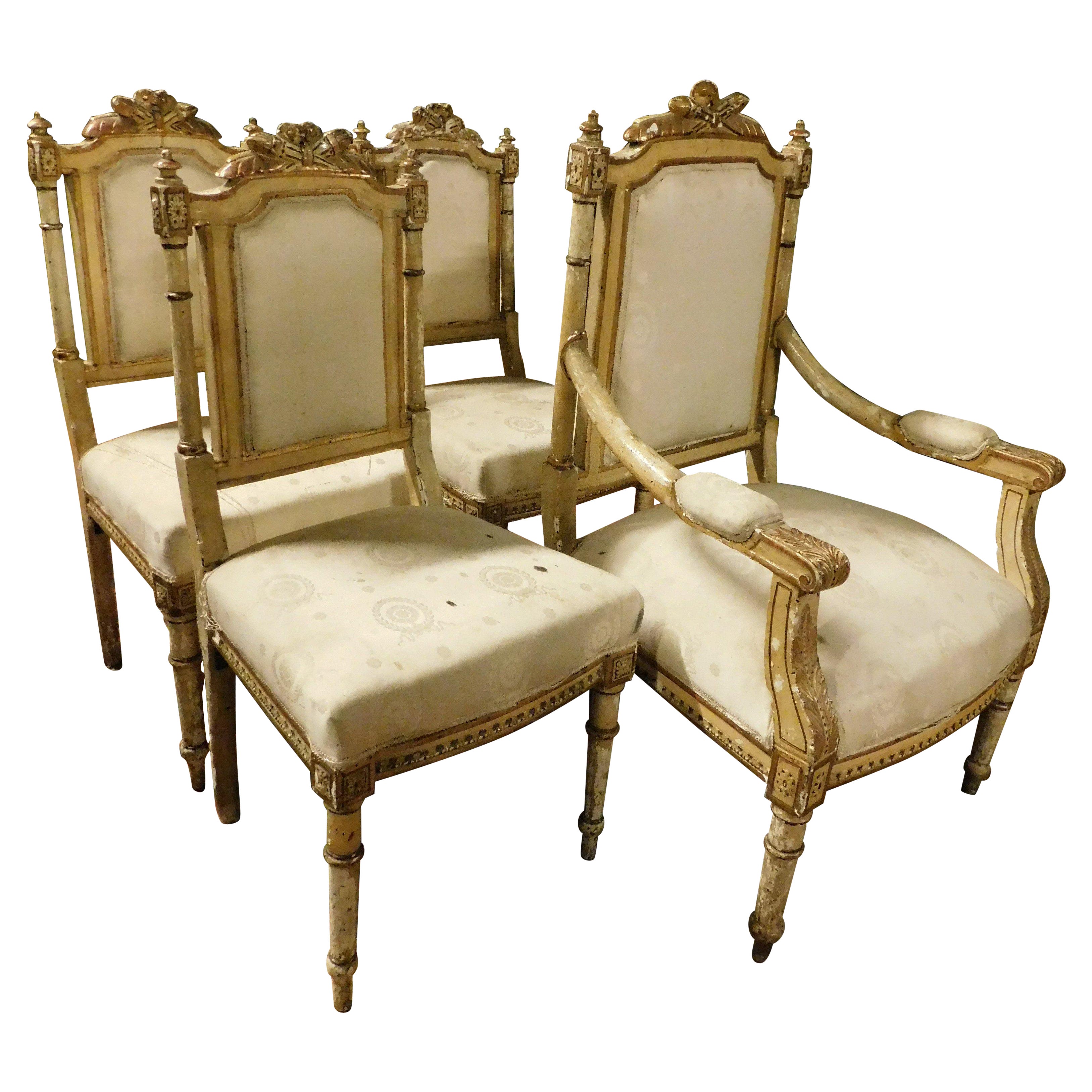 set da salotto con 1 poltrona e 3 sedie intagliate e dorate, Italia