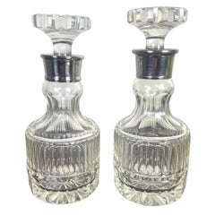 Pareja de decantadores de cristal tallado y plata Años 30