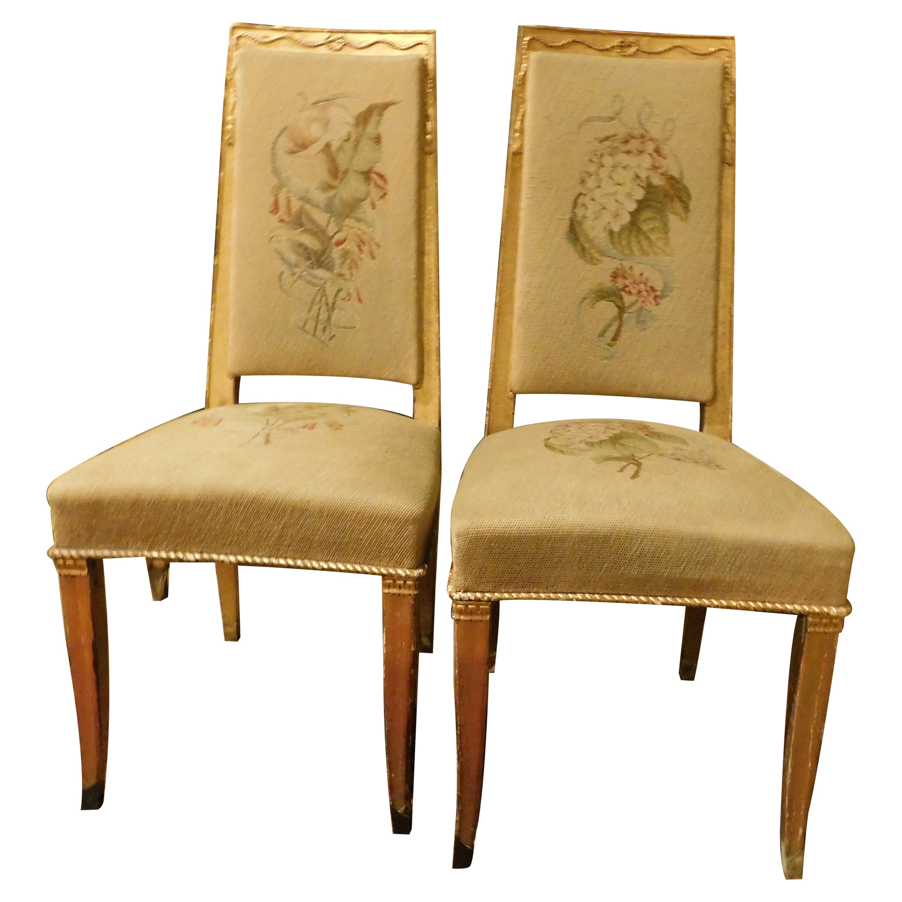 Pair of gilded wooden chairs. with embroidered fabric, Italy