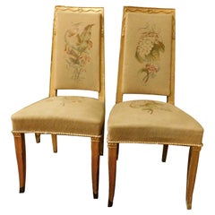 Pair of gilded wooden chairs. with embroidered fabric, Italy