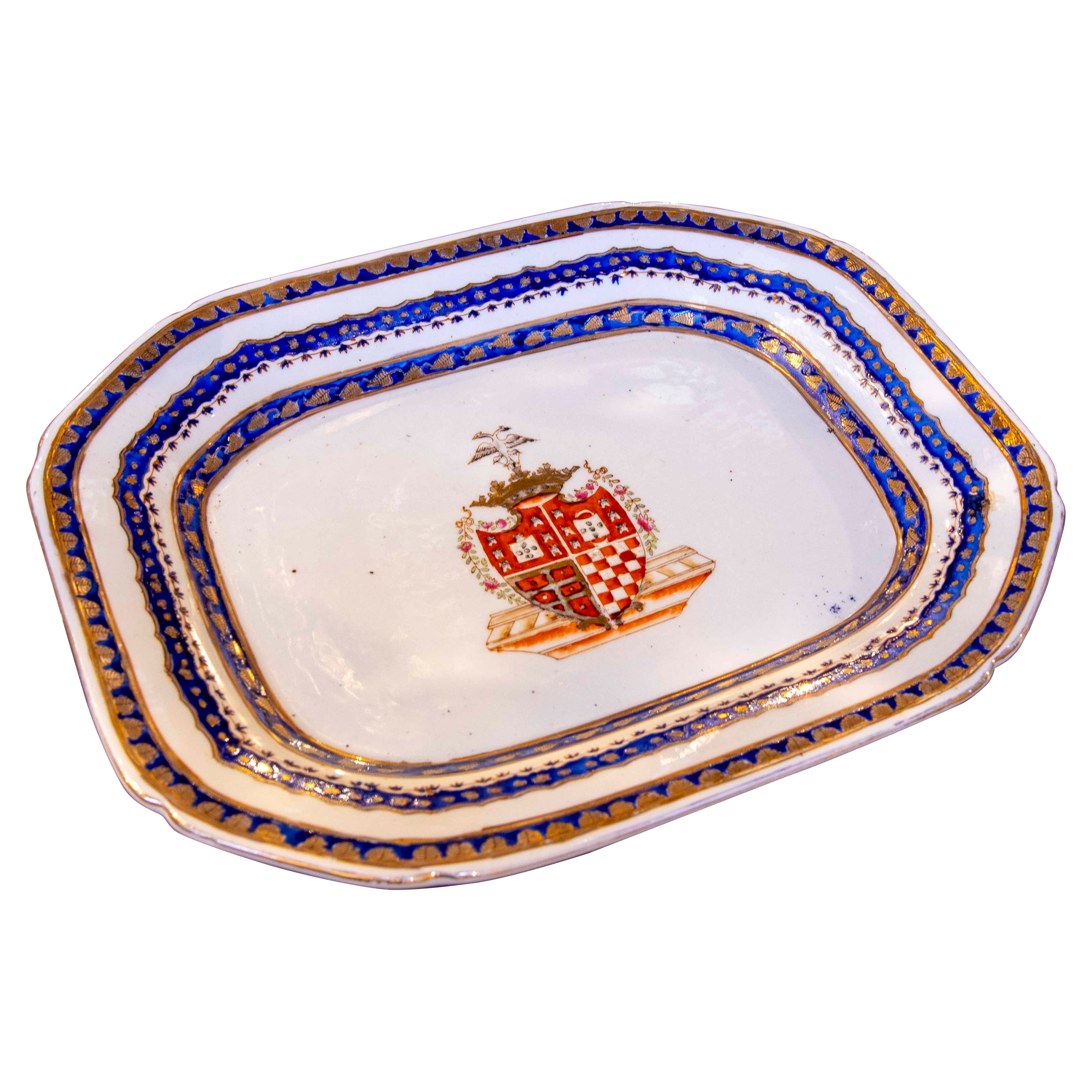 Placa decorativa de los años 70 con un escudo de armas y un sello de fabricante