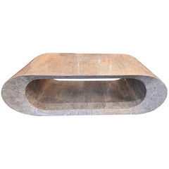 A geometric design tessellated grey marble coffee table