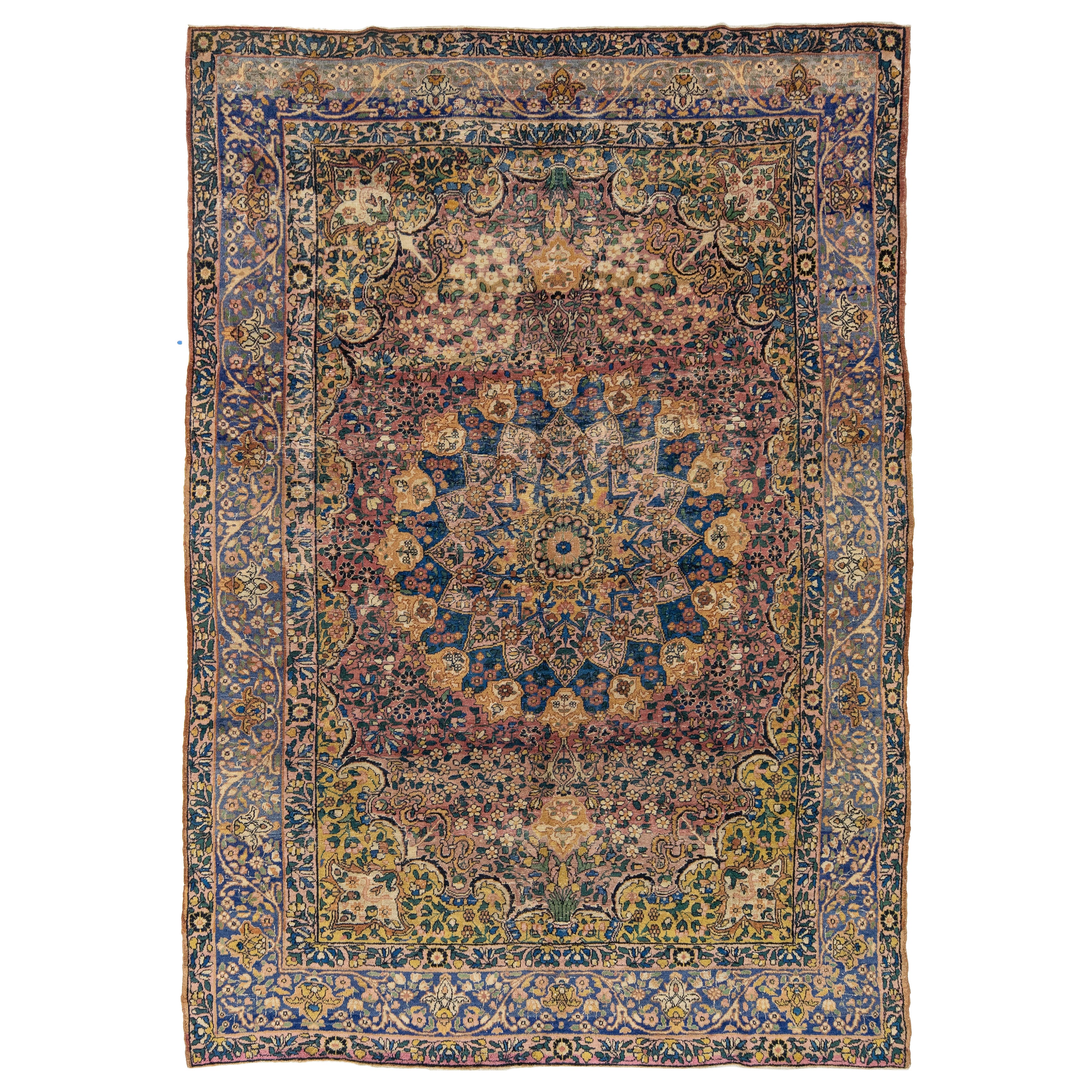 Tapis persan ancien Kerman fait à la main avec un motif de rosettes multicolore