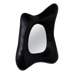 Brutalist sculptural black ebonised mirror by Christophe Daguet