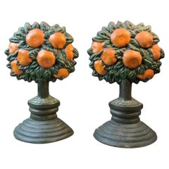 Coppia di fermi per porte in ghisa d'epoca con albero d'arancio ~ fermalibri