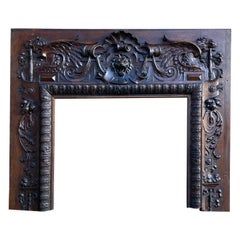 Cheminée en bois de chêne sculpté du 19e siècle