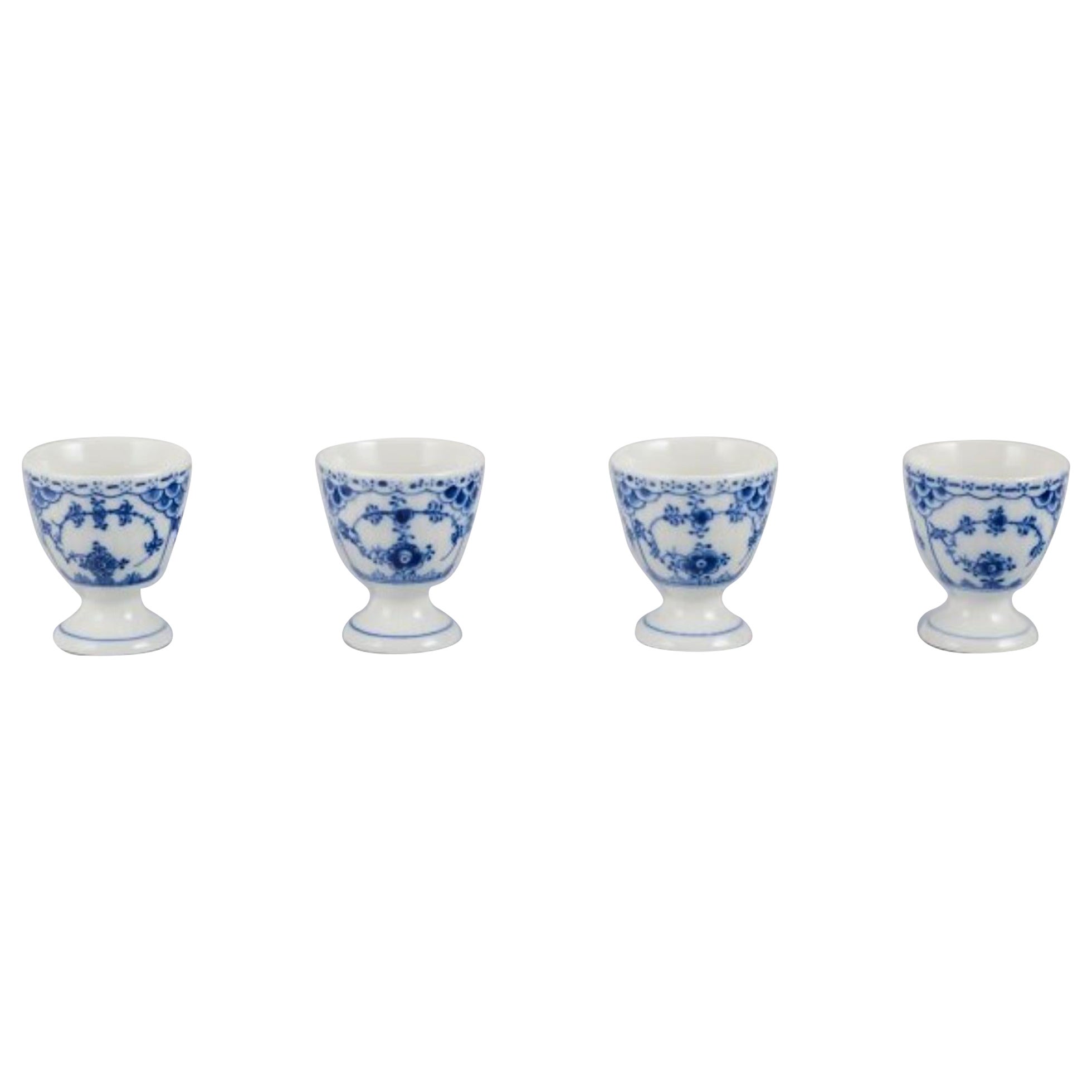 Royal Copenhagen Mezzo pizzo scanalato blu, set di quattro portauovo.