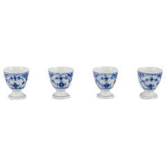 Royal Copenhagen Mezzo pizzo scanalato blu, set di quattro portauovo.